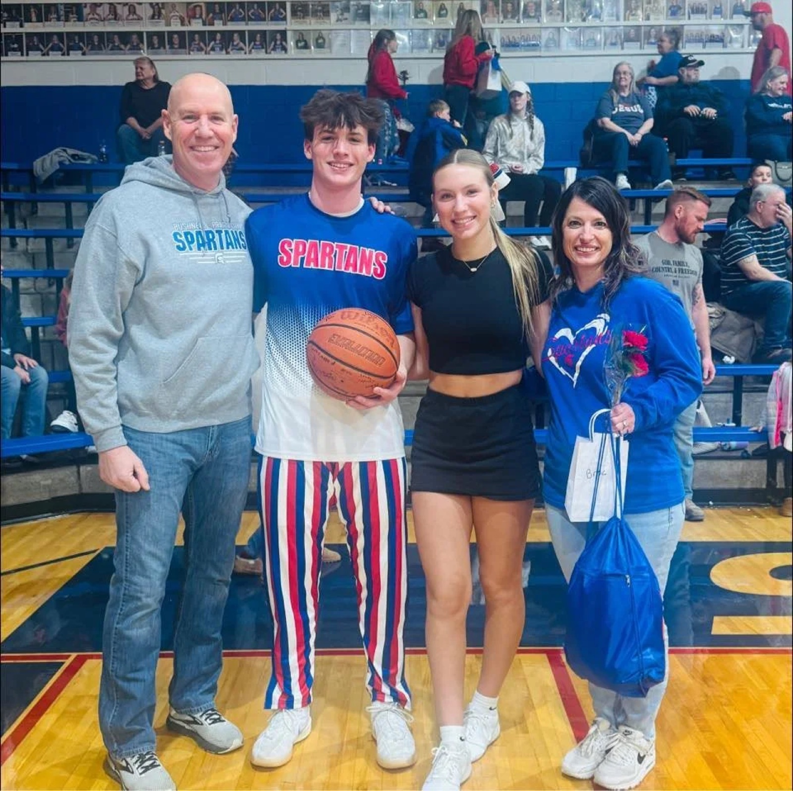 Brad Beekman with his family at a basketball game